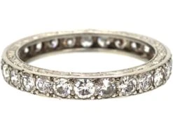 Art Deco Platinum & Diamond Eternity Ring With Incised Decoration On The Sides -Antique Jewellery Company 07e7e39a antique art deco platinum eternity ring2 scaled 1