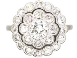 Early 20th Century Platinum, Diamond Daisy Cluster Ring With Outer Ring Of Diamonds
