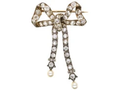 Edwardian Articulated Bow Brooch Set With Diamonds & Natural Pearls