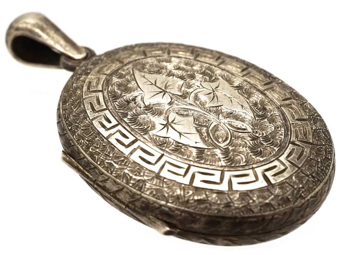 Victorian Silver Oval Locket With Ivy Leaf Detail 4 Victorian Silver Oval Locket With Ivy Leaf Detail - Image 2