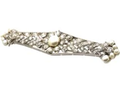 Early 20th Century 18ct White Gold, Diamond & Natural Pearl Brooch By Sybil Dunlop In Original Case 7 Early 20th Century 18ct White Gold, Diamond & Natural Pearl Brooch By Sybil Dunlop In Original Case -Antique Jewellery Company DSC05872 scaled 1
