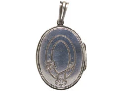 Victorian Oval Silver Locket With Garter Motif