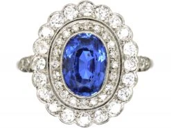 Early 20th Century Platinum, Sapphire & Diamond Oval Cluster Ring With Diamond Set Shoulders