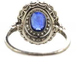 Early 20th Century Platinum, Sapphire & Diamond Oval Cluster Ring With Diamond Set Shoulders -Antique Jewellery Company DSC09026 scaled 1