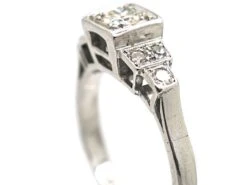 Art Deco Platinum, Diamond Solitaire Ring With Step Cut Shoulders Set With Diamonds -Antique Jewellery Company c9f54a4e dsc04703 scaled 1